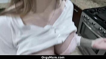 Busty stepmom gets down on her knees for her stepson's big cock