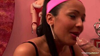 Busty brunette enjoys a sideways fuck with a condom