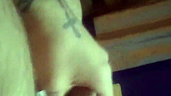 guy wanking his cock until he cums hard on himself