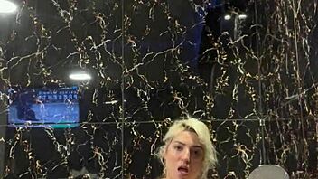 blonde performs handjob in jacuzzi with instructions