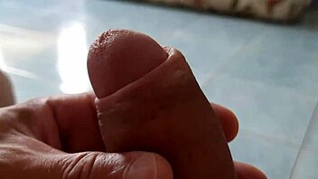 Solo mature gay man masturbating his huge dick in private