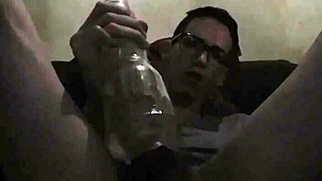 Gay guy masturbates with toy in HD video