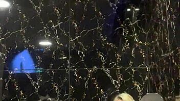 blonde performs handjob in jacuzzi with instructions