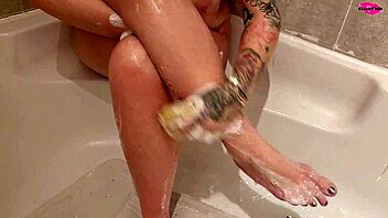 milf seductivly washing her feet