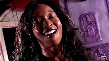 ebony stripper chats with girlfriend during lap dance