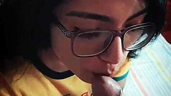 Argentinian girl wears glasses during blowjob and gets facial