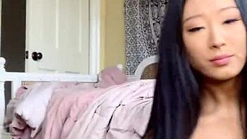 Watch this cute Asian undress and masturbate with dildo for you?