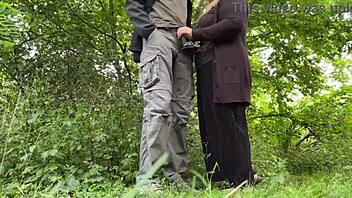 BBW milf gives a handjob outdoors while wearing sexy panties