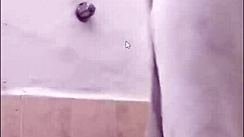 Taking a shower while masturbating in the bathroom