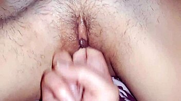 Hairy pussy swallows fingers in lesbian illusion