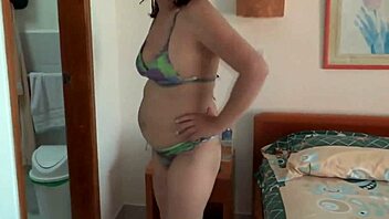 my mature latina wife, 58, basks on beach with lover, ending in big cumshot on hairy mound.