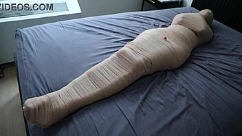 Teased and bound: Roxy's remote toy play and mummification