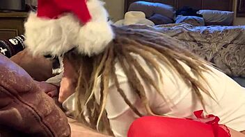 a cute masked girl in stockings enjoys holiday sucking