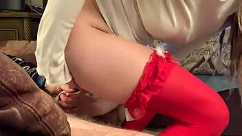 a cute masked girl in stockings enjoys holiday sucking