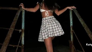 Teen girl masturbates outdoors and squirts on the street