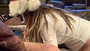 Masked cutie gives a passionate blowjob in red stockings
