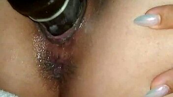 Wife slams dildos hard in homemade anal play