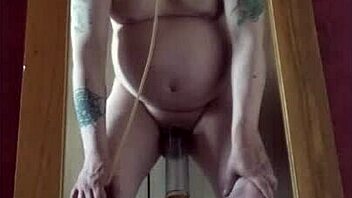 Cock-loving bisexual male takes on different coloured piss in homemade video