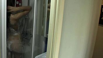 my girlfriend enjoys a relaxing bath in the bathroom