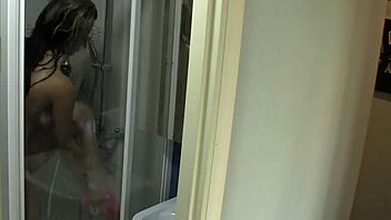 my girlfriend enjoys a relaxing bath in the bathroom