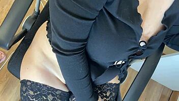 A blonde bombshell in a revealing workout outfit seduces her boss