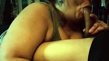 Redhead MILF SUCKS COCK then TITTY FUCKS it