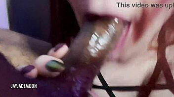 sexy redhead gives sloppy sensual deepthroat blowjob to big black cock in homemade couple scene