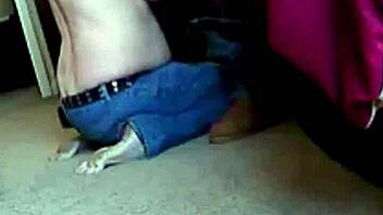 the redhead milf at home deepthroats a massive black cock, choking and gagging