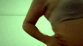 Sexy dancer plays with her pussy while dancing on stage