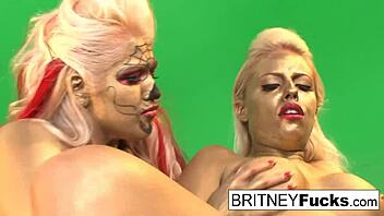 Blonde and brunette pornstars explore each other's bodies in sexy video