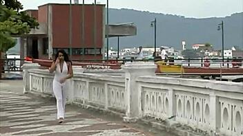 brunette babe flaunts her ass and tits outdoors in santos port