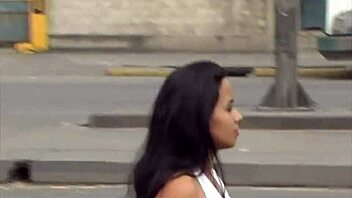 brunette babe flaunts her ass and tits outdoors in santos port