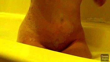 latina babe enjoys bath time with her big tits on display