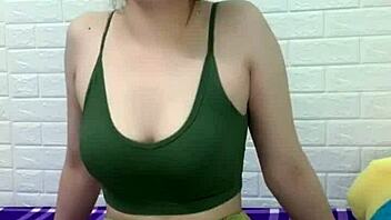 asian girl cooks white rice at home