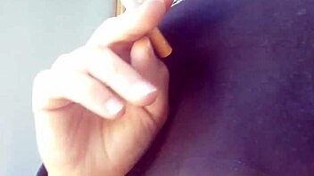 Indulging in a smoke fetish with a seductive model