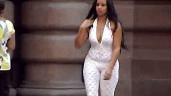 brunette babe flaunts her ass and tits outdoors in santos port