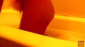 latina babe enjoys bath time with her big tits on display