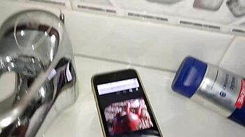 Gardener discovers boss's iphone and goes to bathroom after finding her page on videos while she washes dishes