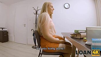 A loan4k applicant engages in sexual activities with a moneylender to improve her chances.