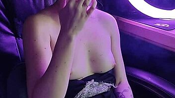 Seductive Asian woman indulges in cigarette fetish