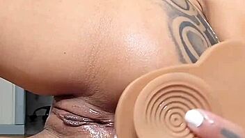 Brunette Prostitute Seduces With Dildo In Pussy And Ass