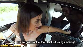 Busty European cab driver gives oral and receives black cock in car