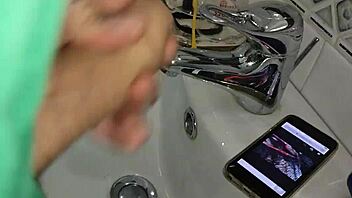 Gardener discovers boss's iphone and goes to bathroom after finding her page on videos while she washes dishes