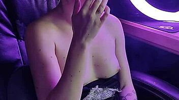Seductive Asian woman indulges in cigarette fetish