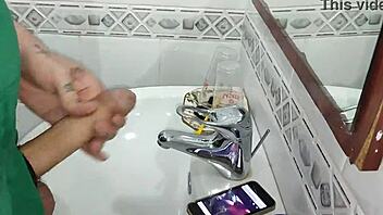 Gardener discovers boss's iphone and goes to bathroom after finding her page on videos while she washes dishes