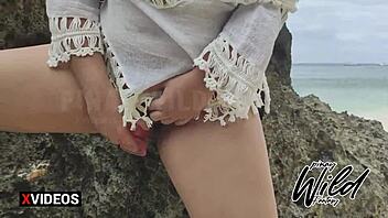 Curvy Filipino wife pleasures herself with a dildo at a public beach in Boracay, causing a scandal
