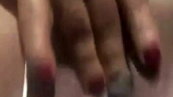 A mature latina engages in a messenger video chat session.