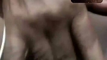 A mature latina engages in a messenger video chat session.