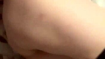 Stunning babe in lingerie and stockings teases with solo play action!