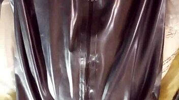 Gay amateur shows off his latex fashion sense